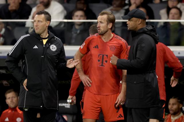 Harry Kane and Vincent Kpmpnay