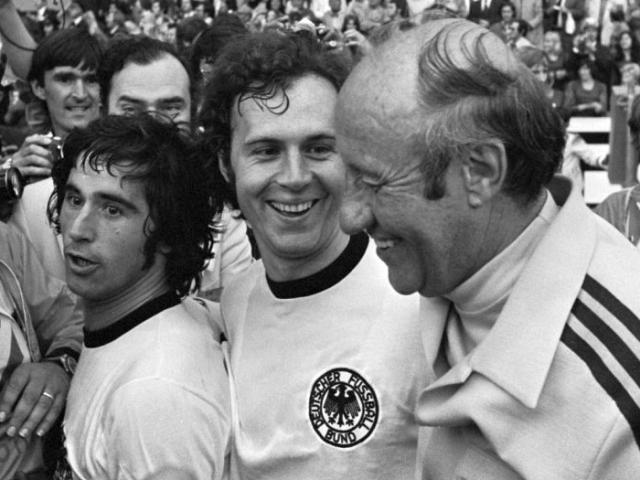 Gerd Müller, Franz Beckenbauer and coach Helmut Schön after Germany's World Cup final win in 1974.