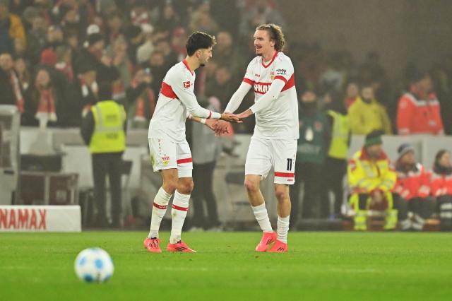 Nick Woltemade celebrates scoring a blitz brace at the MHP Arena.