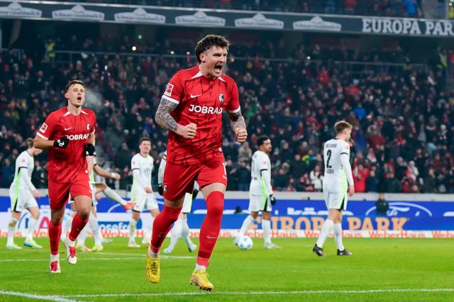 Lukas Kübler celebrates scoring against Wolfsburg on Friday night.