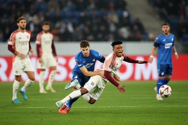 Gift Orban (right) is fouled by Anton Stach, who is now his teammate at TSG Hoffenheim.