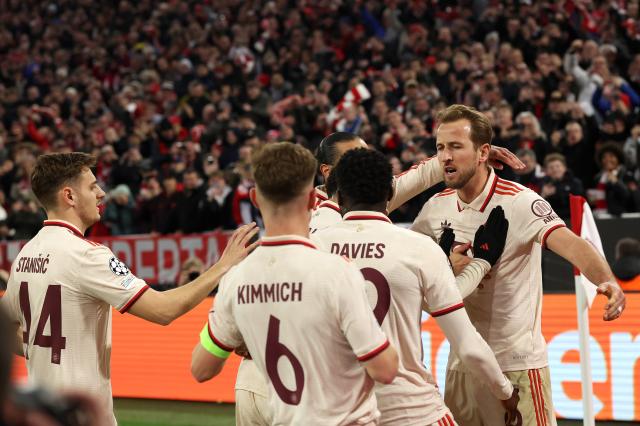 Bayern celebrate Harry Kane's second goal against Bayer Leverkusen.