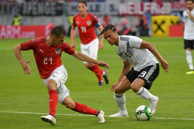 Konrad Laimer (left) and Leroy Sané (right).