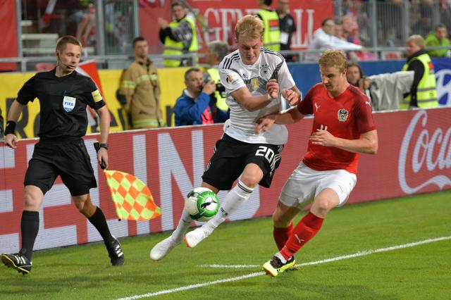 Julian Brandt (left) while playing for Germany.