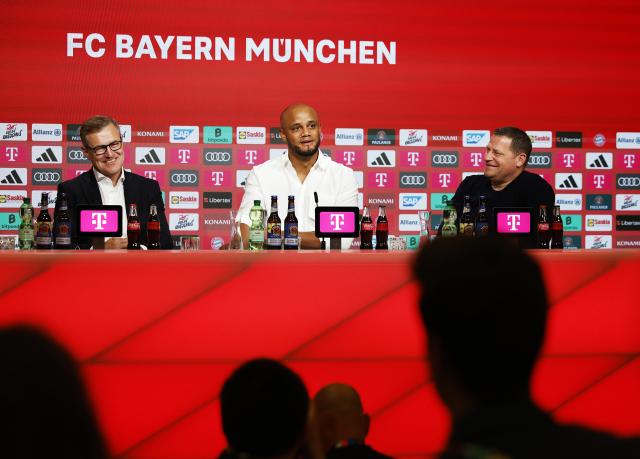 Jan-Christian Dreesen, Vincent Kompany, Max Eberl.