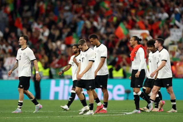 Players of the German national team walking off the field following defeat to Portugal, 4. June 2025.