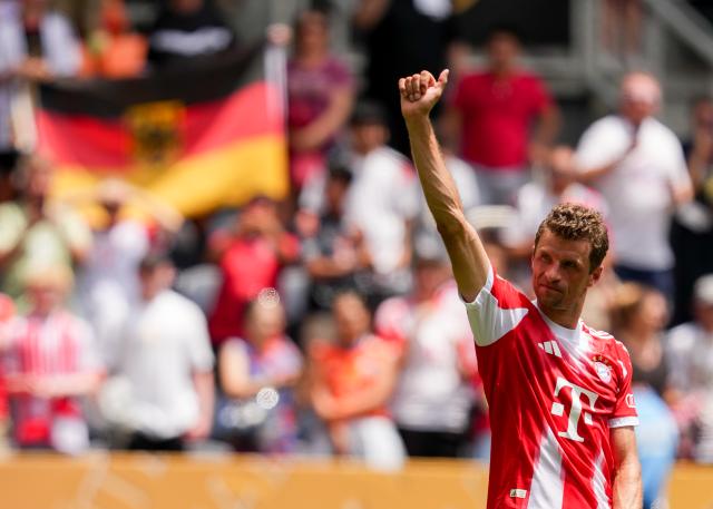 Thomas Müller of Bayern München acknowledges the fans after beating Auckland City 10-0 in the FIFA Club World Cup.