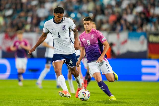 Jarell Quansah of U21 England runs with the ball against U21 Germany.