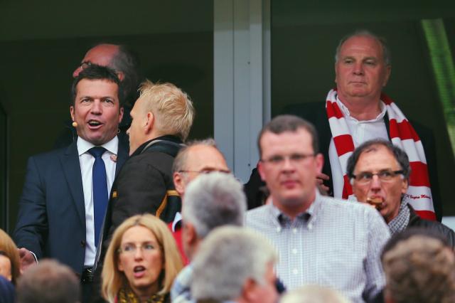 Lothar Matthäus sitting next to Uli Hoeneß.